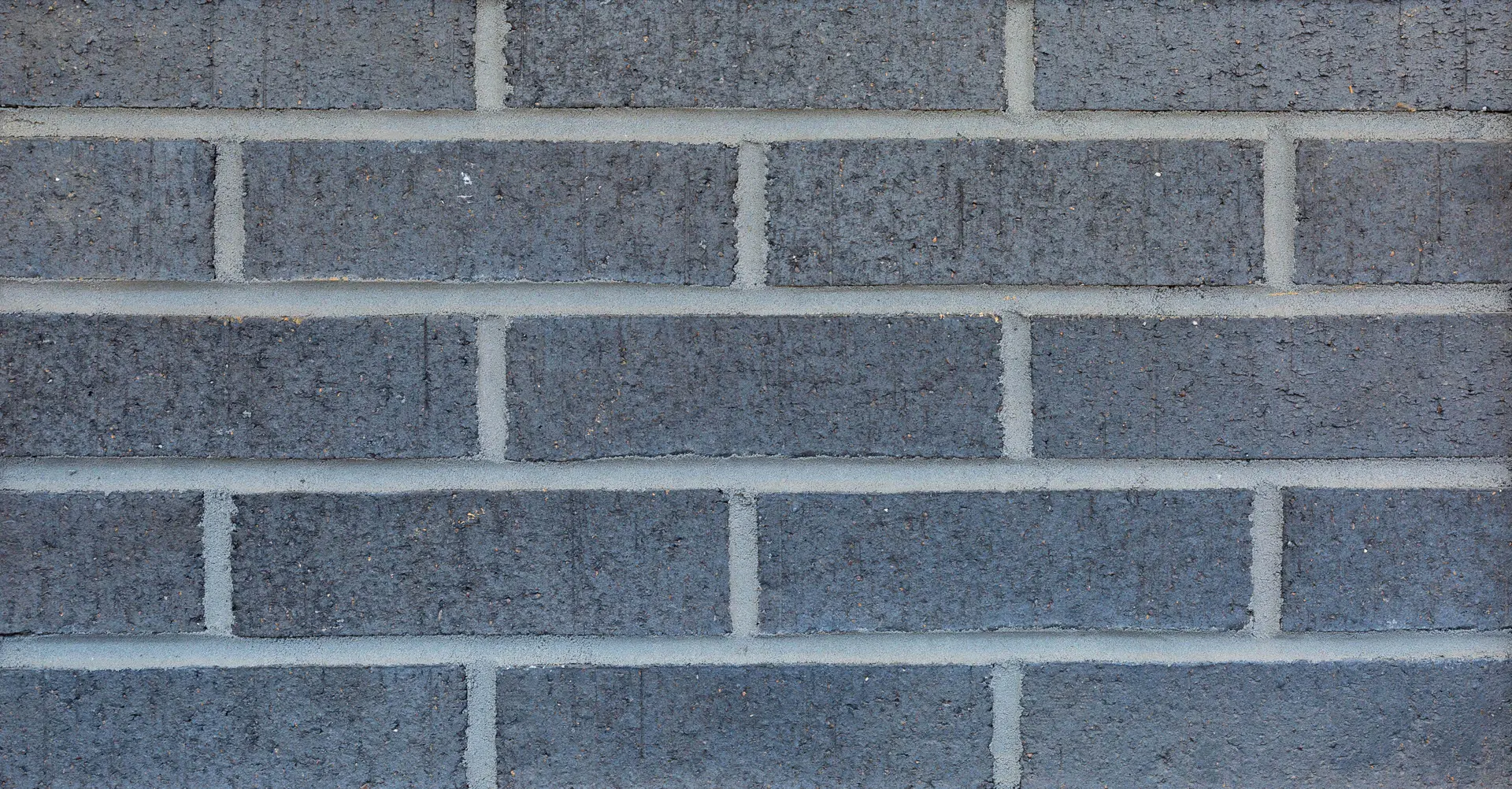 Cobalt Black Brick Wall